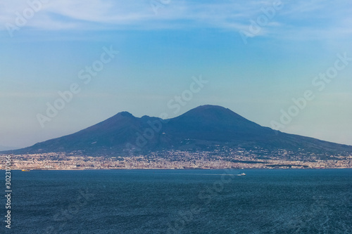 classic view of the Vesuvius volcano in the distance in Naples, Campania, Italy