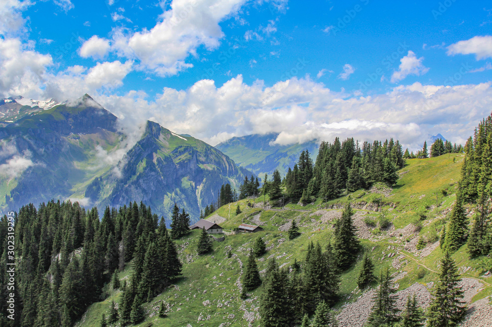 Colorful mountain landscape of the Swiss Alps on a summer day 