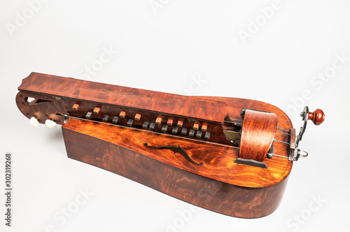 Bild auf Leinwand Hurdy gurdy musical instrument on white