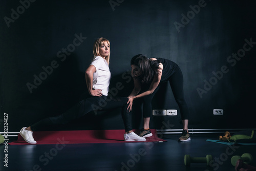 Fitness woman black background