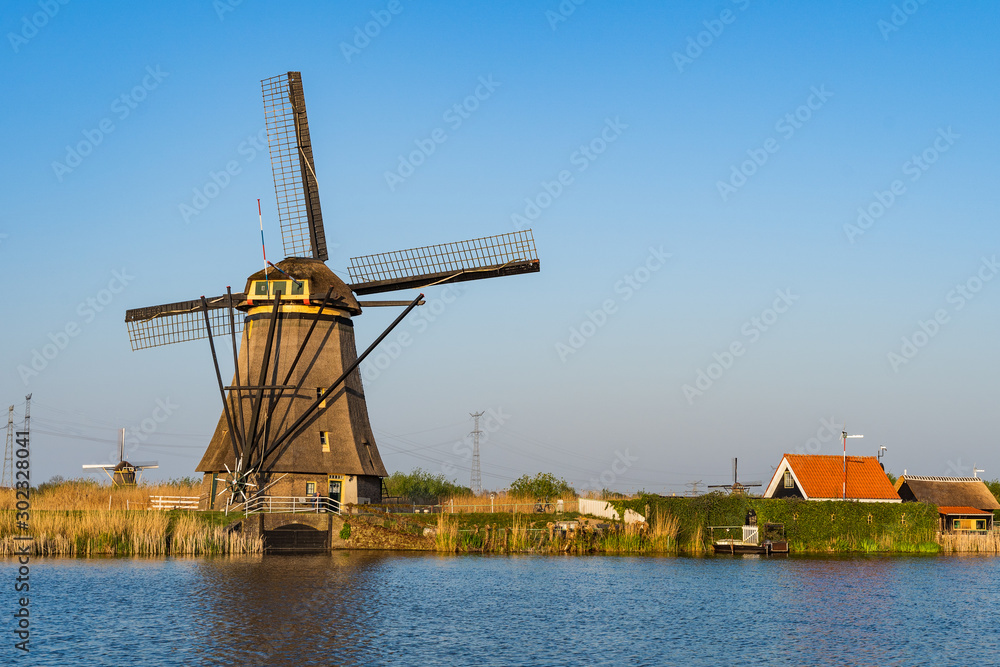 Famous wind mills at Kinderdijk, near Rotterdam in Netherland Famous wind mills at Kinderdijk, near Rotterdam in Netherland