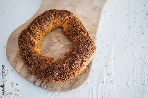 Turkish fast food bagel called Simit. Turkish bagel Simit with sesame. Bagel is traditional Turkish bakery food.