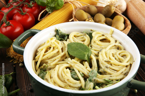 Spaghetti with gorgonzola and spinach souce with ingredients