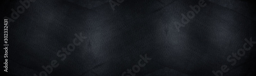 Black wide panorama canvas pattern background. Surface with spotlight, dark tone.