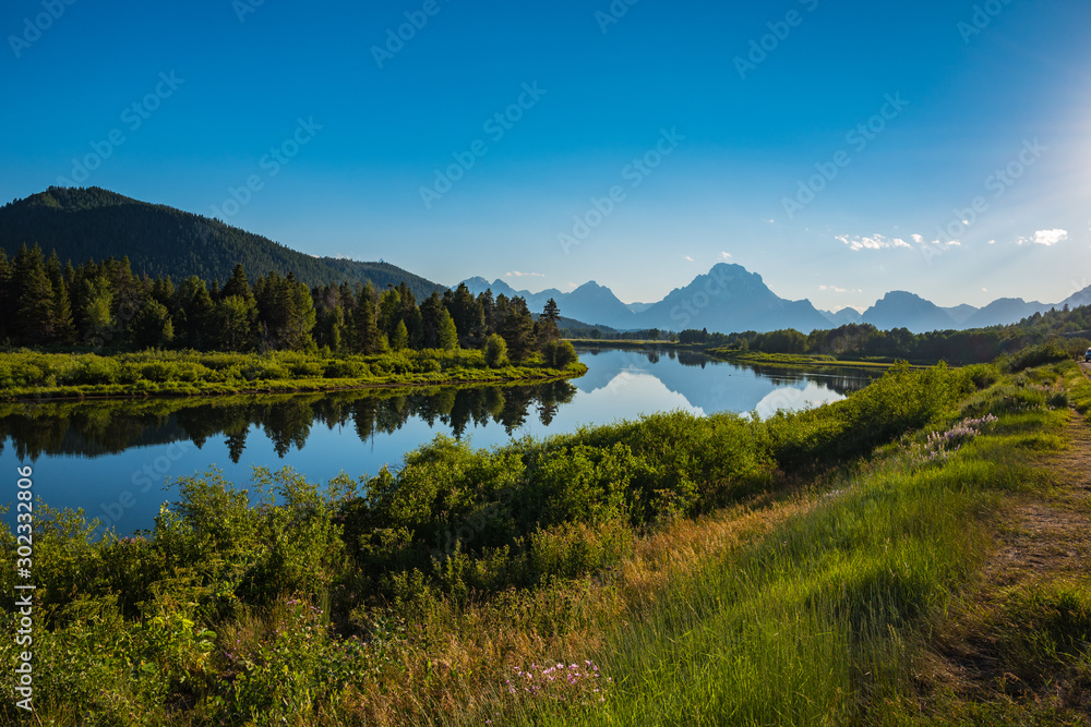 Dramatic photo of Oxbow, Snake River, Grand Tetons in evening