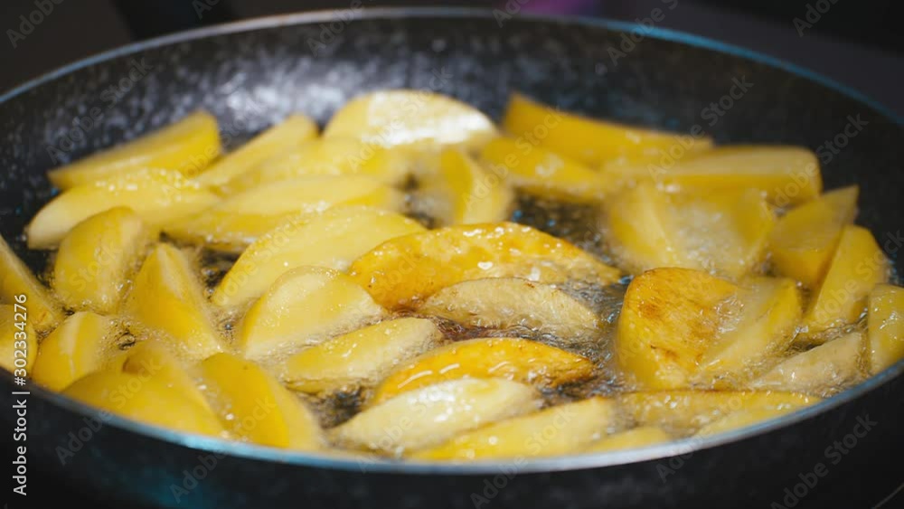 Potatoes Fried in oil. Cooking fried potatoes. Potatoes Fried in oil. Cooking fried potatoes.