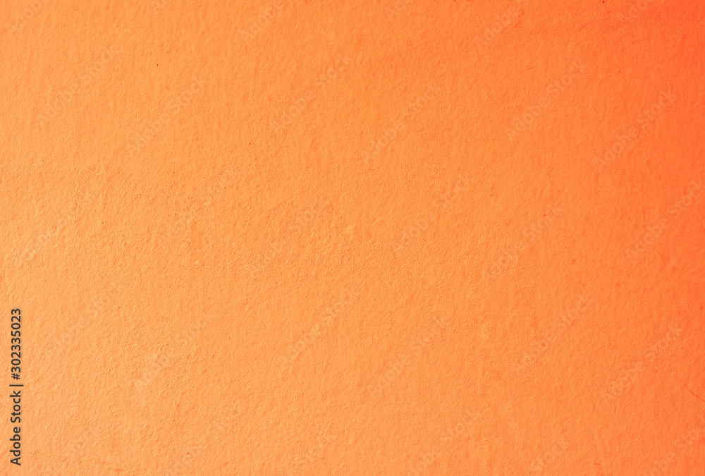 Fototapeta premium Orange painted wall texture with copy space your writing text on empty background.