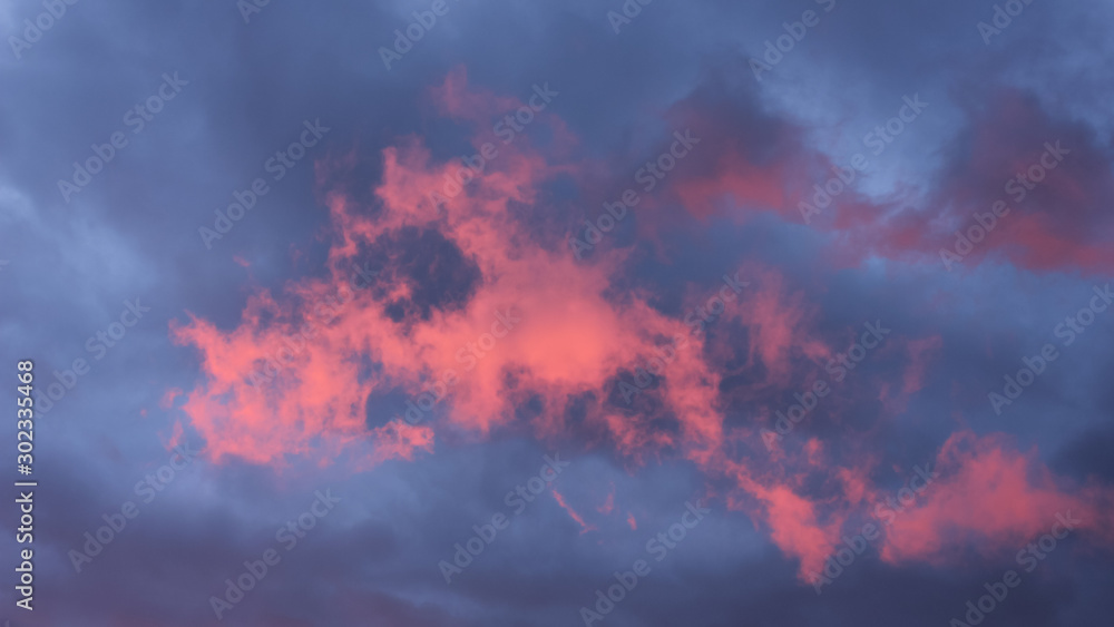 Pink cloud showing up for a short moment just after sunrise. Scene in Dalsland, Sweden. Pink cloud showing up for a short moment just after sunrise. Scene in Dalsland, Sweden.