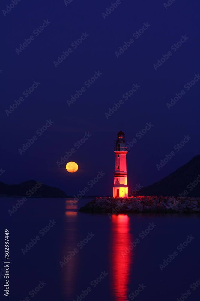 Seaside town of Turgutreis and spectacular sunsets. With full moon.