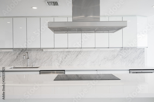 Принти на полотні White glossy Kitchen with cooktop in Island and vent