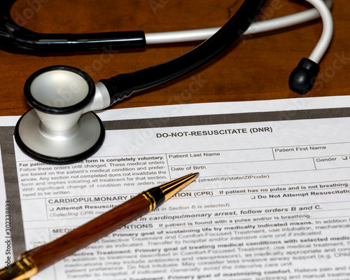 Obraz na plátne DNR, do not resuscitate, advanced directive medical form with stethoscope and ball point pen