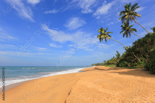 Sun, sand and ocean beach in Sri Lanka
