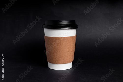 Photos taza de café de papel desechable con funda
