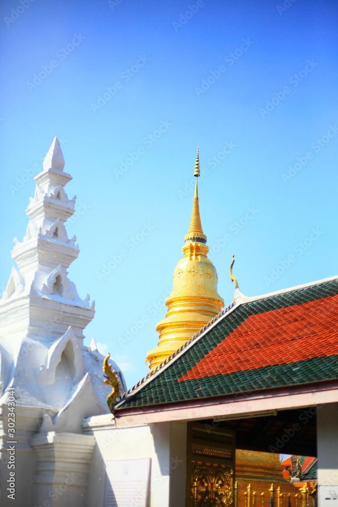 Golden pagoda with blue sky