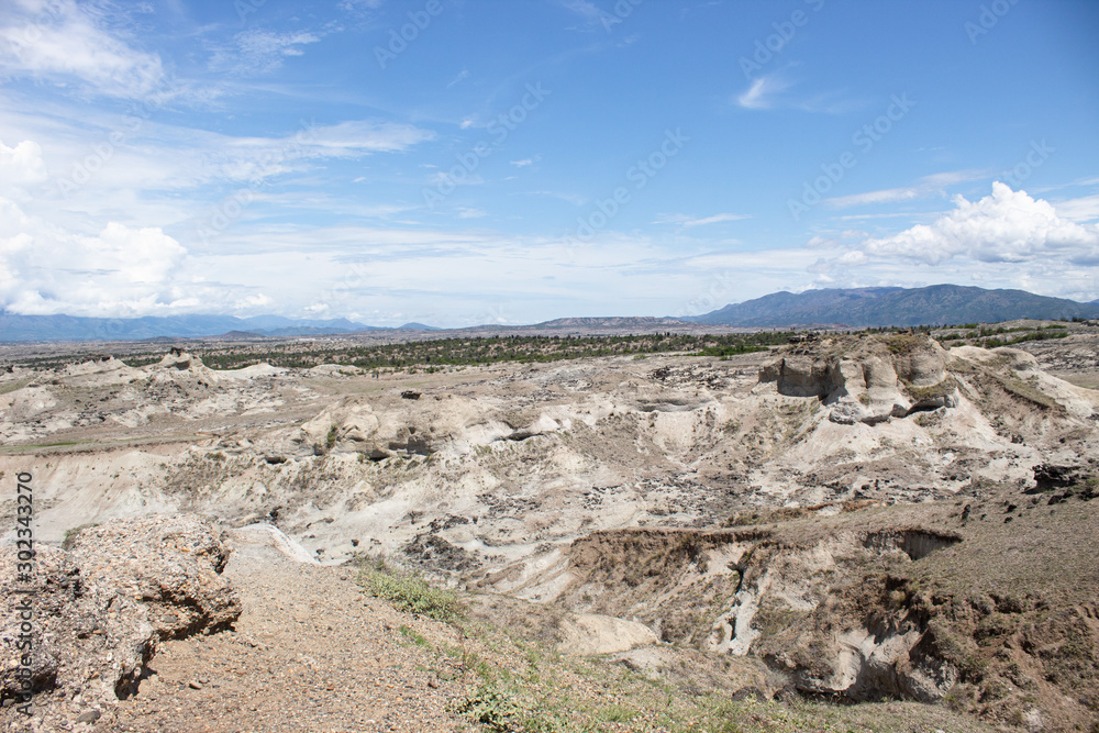 Tatacoa Desert White Sand Landscape with clouds and blue sky