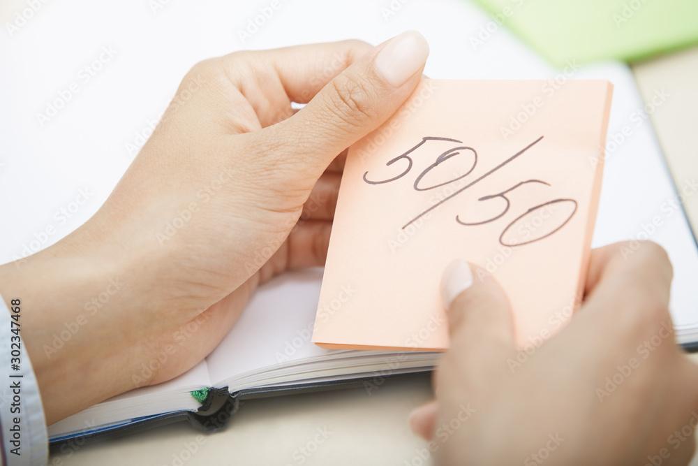 Equal chances on adhesive note