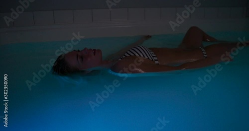 In this collection a young woman is enjoying a session in a salt water float tub.  One of the newest trends in spa health and wellness!  This collection was shot on a RED Gemini in 5K resolution with 