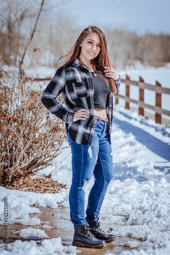 Beautiful young lady posing in a cold weather