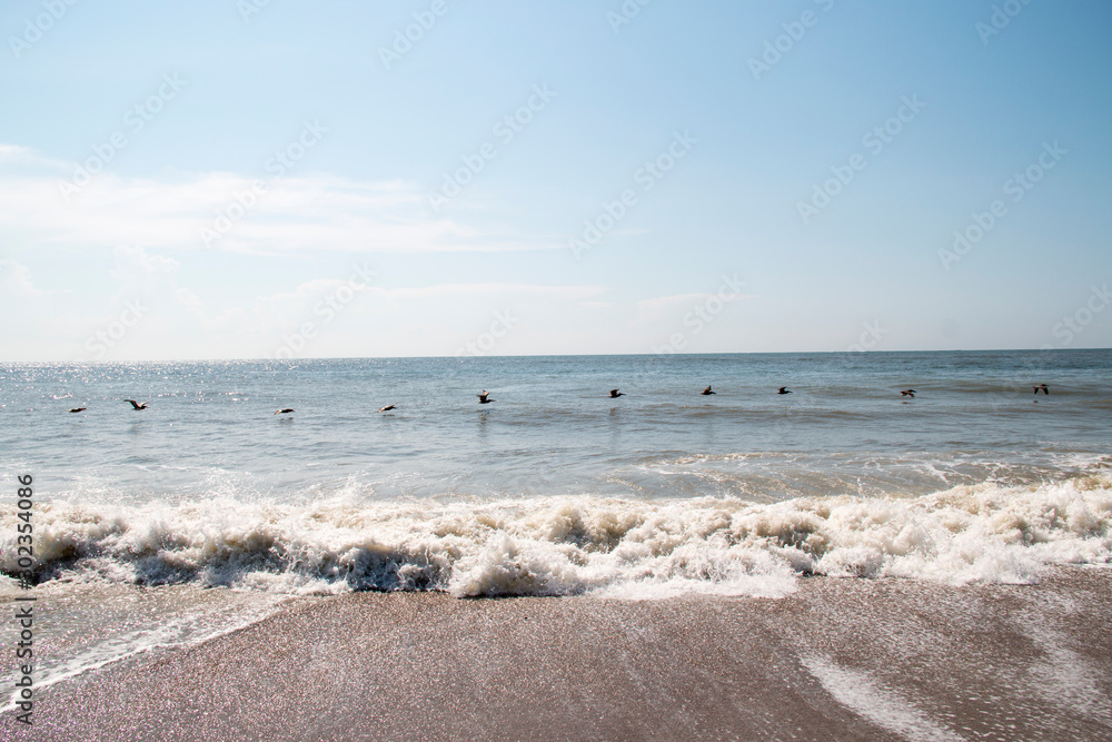 Ocean wave crashing on a beach