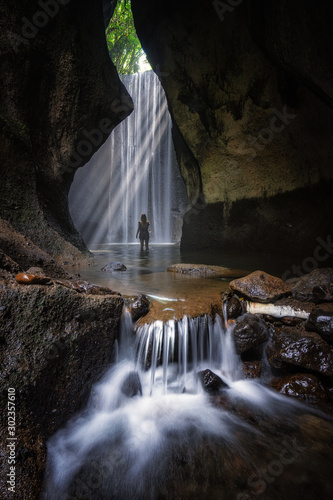 Tukad Cepung waterfall located in Bali photo