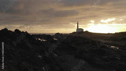 Wallpaper Mural Favaritx Lighthouse Menorca Drone Flight Close up to the Sunrise  top view Torontodigital.ca