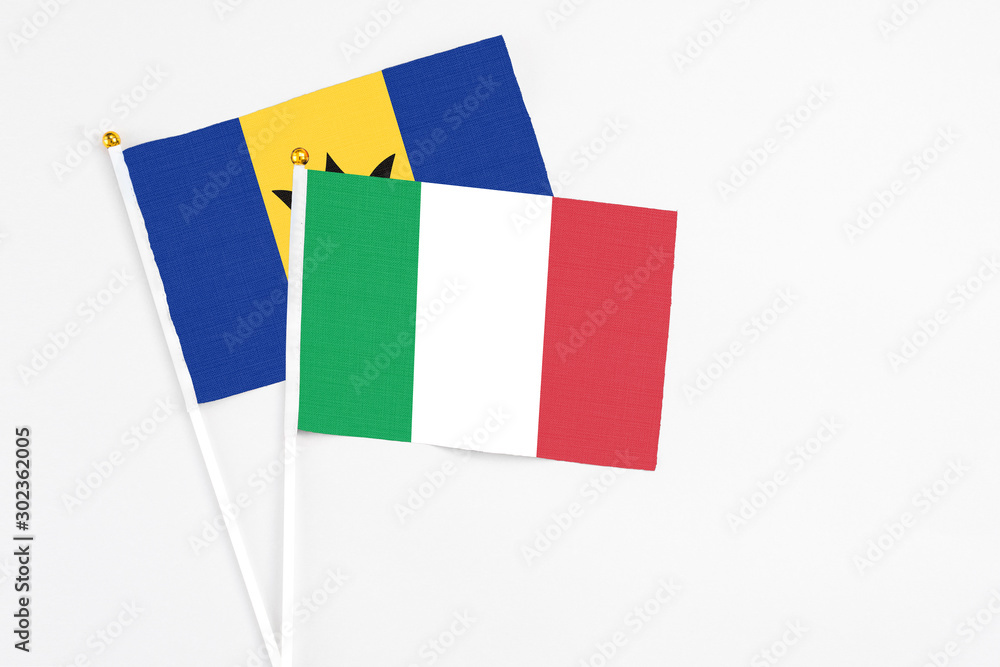 Italy and Barbados stick flags on white background. High quality fabric, miniature national flag. Peaceful global concept.White floor for copy space. Italy and Barbados stick flags on white background. High quality fabric, miniature national flag. Peaceful global concept.White floor for copy space.