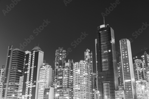 high rise building and skyline of Hong Kong city at night © leeyiutung