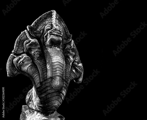 Serpent king or king of naga statue isolated on black
