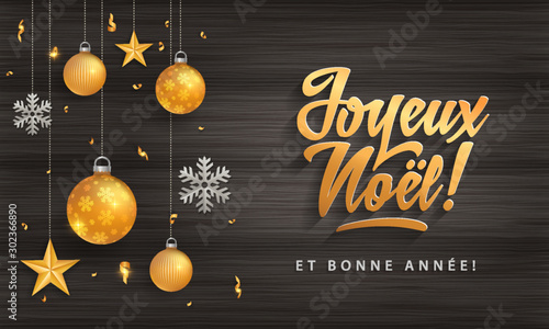 Joyeux Noel - Merry christmas in french language black wood card template glitter gold elements, snowflakes, stars and calligraphy