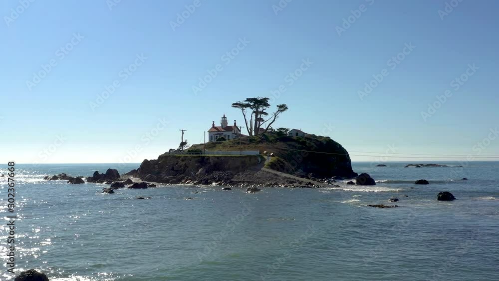 Battery Point lighthouse low angle drone flying in bright light Battery Point lighthouse low angle drone flying in bright light