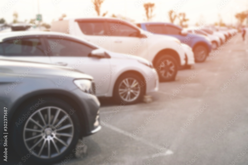 photo blurred aerial car parking lot outdoors Square, cars in row Parking on the side of the road and evening sun. Leave space empty for text. photo blurred aerial car parking lot outdoors Square, cars in row Parking on the side of the road and evening sun. Leave space empty for text.