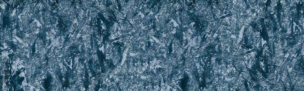 Wide large blue OSB texture with frost surface effect. Long creative winter background Wide large blue OSB texture with frost surface effect. Long creative winter background