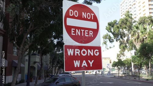 Do not enter wrong way warning sign in front of building