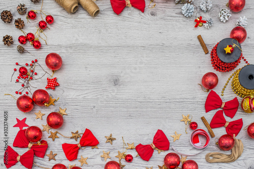 Christmas composition. red decorations on wooden background. Christmas, winter, new year handmade concept. Flat lay, top view, copy space. Free placefor text. photo