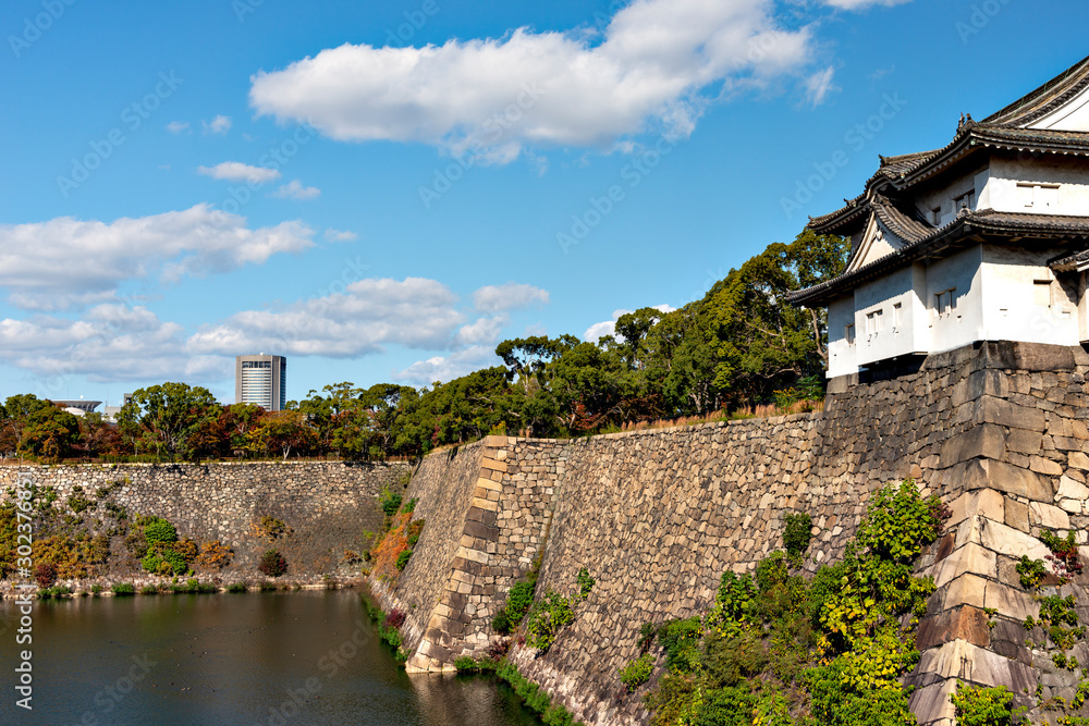 Defensive stone wall of Osaka-jo castle in autumn