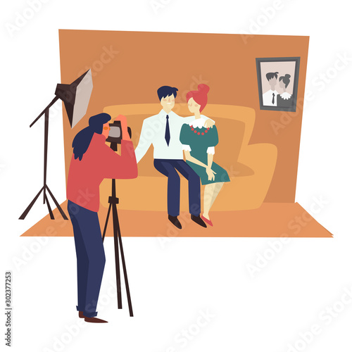 Photographer with camera and studio, family photoshoot, married couple on couch