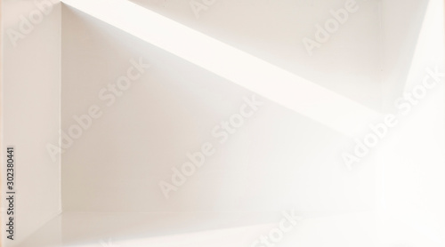 Fototapeta Naklejka Na Ścianę i Meble -  The scene in a white room with empty space and refraction of light and shadow