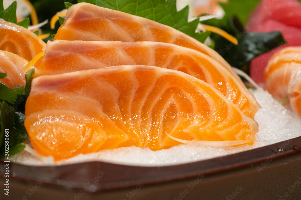 Raw salmon sashimi slice on ice Japanese food Raw salmon sashimi slice on ice Japanese food