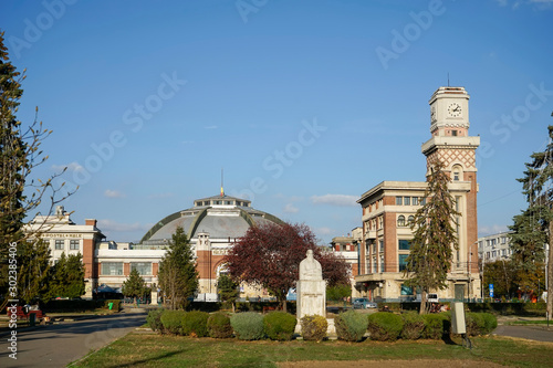 The Central Market historic building and the tower clock in Ploiesti City, Romania, by architect Toma Socolescu photo