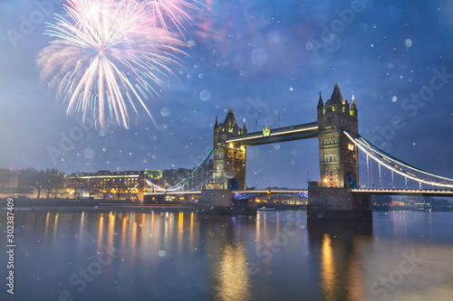 Famous Tower Bridge in the evening with fireworks, London, England