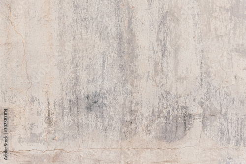 abstract background of old painted white concrete wall close up