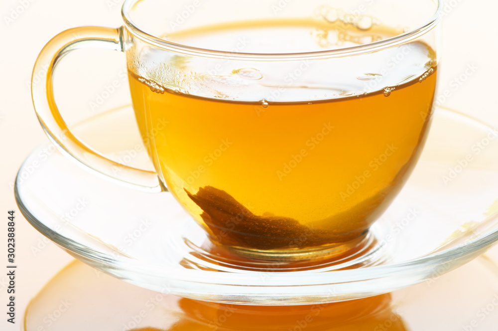 Fresh hot tea in glass cup cllose-up Fresh hot tea in glass cup cllose-up