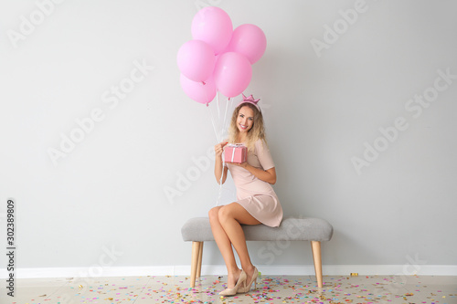Beautiful young woman with ...
