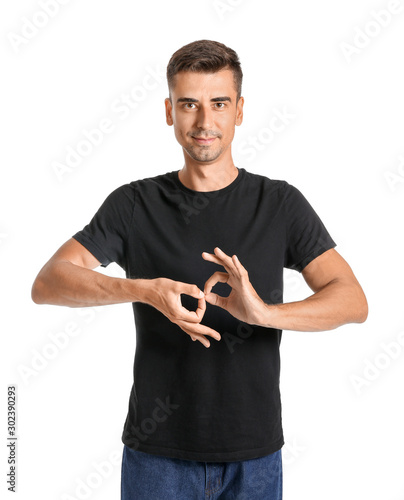 Young deaf mute man using s...