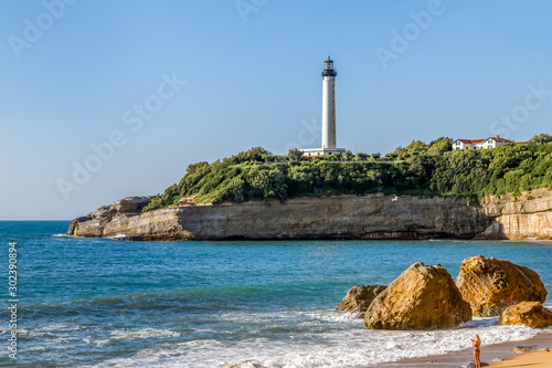 Biarritz Lighthouse (Faro de Biarritz) on the cliff. Holidays on the Basque coast of France.