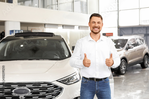 Happy man after buying new ...