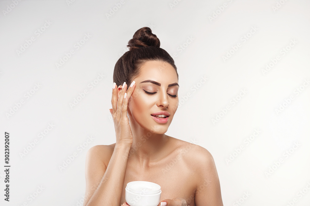 Beauty Woman Concept Skin Care Portrait Of Female Model Holding And Applying Cosmetic