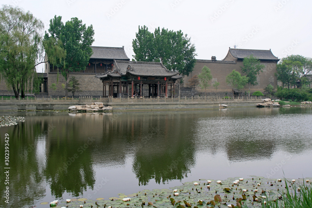 buildings and lake - chang's mansion - pingyao - china buildings and lake - chang's mansion - pingyao - china
