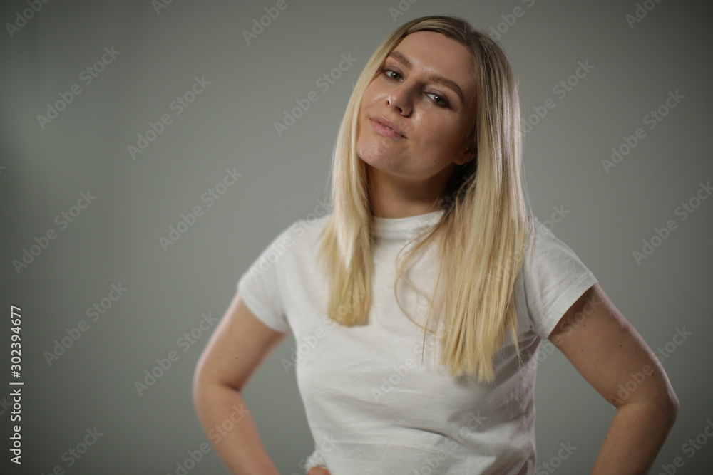 A beautiful blonde woman smiles A beautiful blonde woman smiles