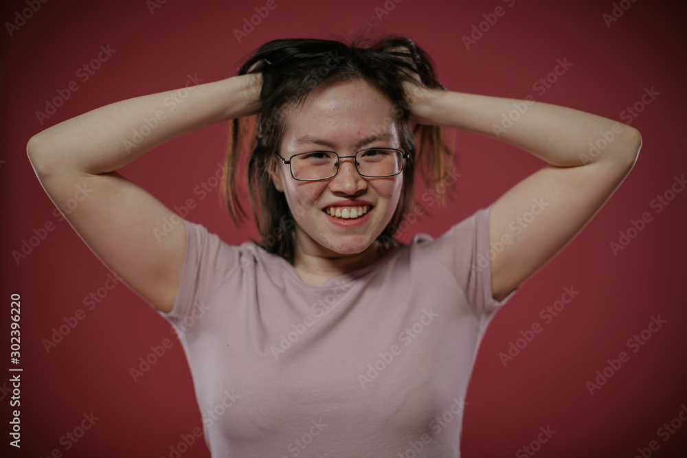 Joyful girl in Nude t-shirt laughs. Joyful girl in Nude t-shirt laughs.